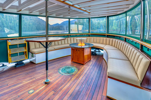 Covered fantail sun lounge on Alaska Charters